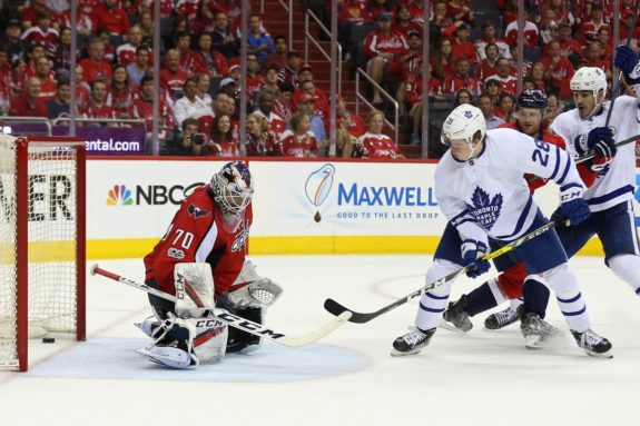 Washington Capitals goalie Braden Holtby and Toronto Maple Leafs forward Kasperi Kapaneen