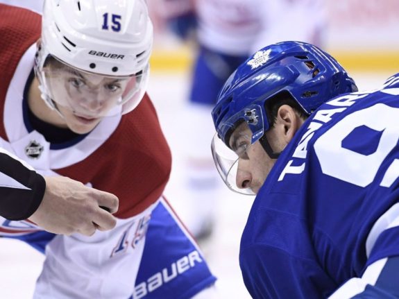 Toronto Maple Leafs forward John Tavares and Montreal Canadiens forward Jesperi Kotkaniemi 