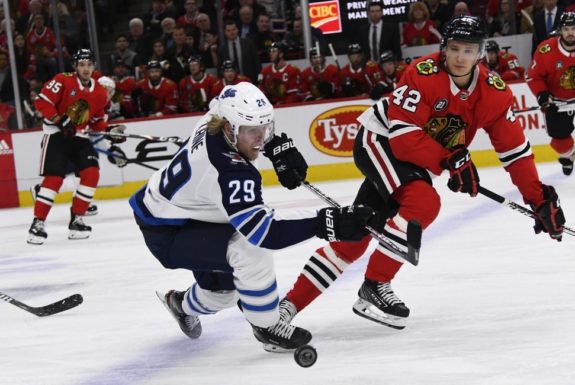 Winnipeg Jets Patrik Laine Chicago Blackhawks Gustav Forsling