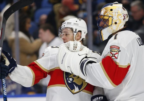 Florida Panthers Evgenii Dadonov and Roberto Luongo