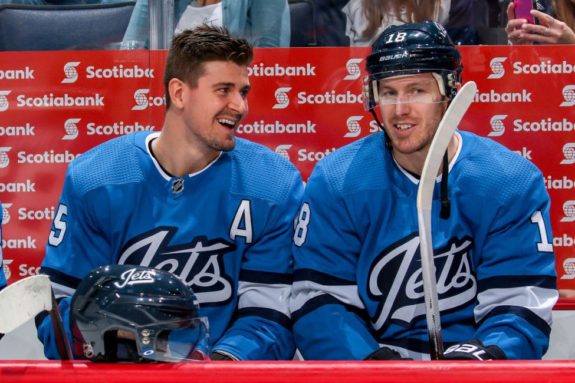 Mark Scheifele #55 and Bryan Little #18