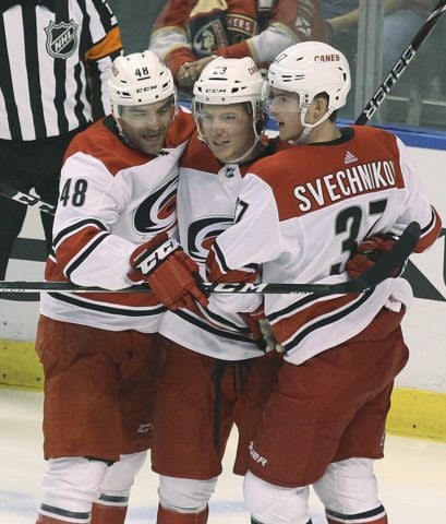 Carolina Hurricanes' Brock McGinn Jordan Martinook Andrei Svechnikov