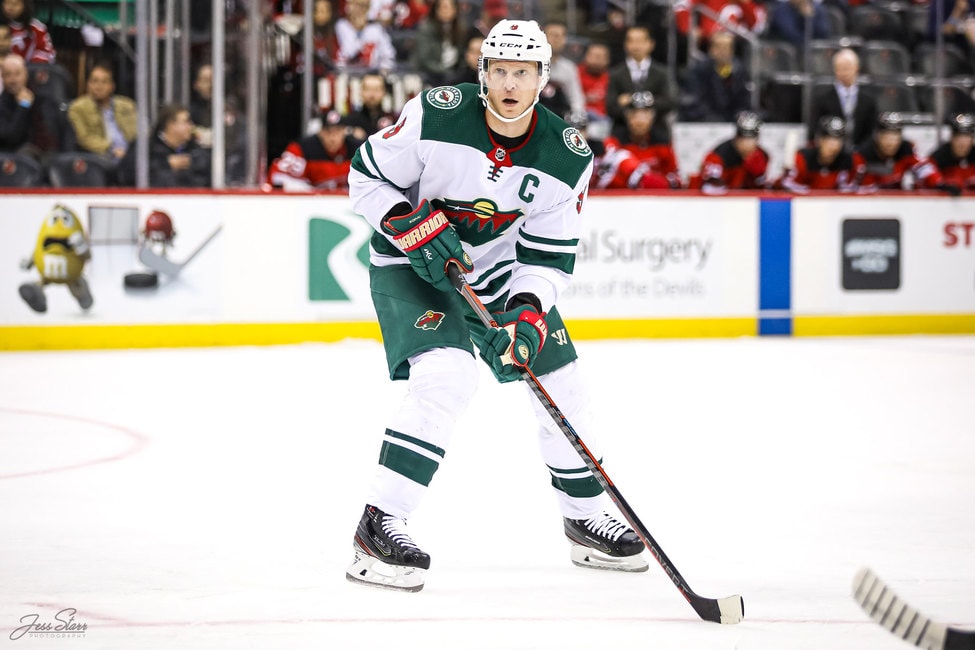 Minnesota Wild Captain Mikko Koivu (9) warms up wearing a 1967 era