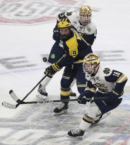 Notre Dame's Jake Evans Michigan's Josh Norris