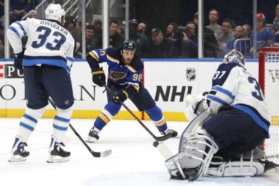 Dustin Byfuglien, Connor Hellebuyck, Ryan O'Reilly