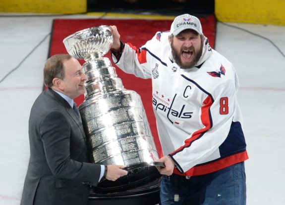 Gary Bettman presents Washington Capitals left wing Alex Ovechkin (8) with the Stanley Cup
