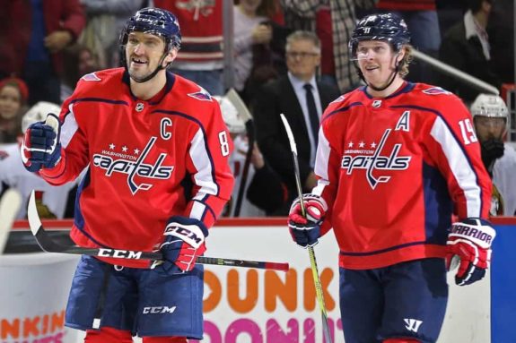 Alex Ovechkin celebrates with Capitals center Nicklas Backstrom