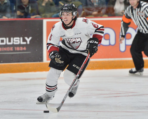 Ryan Merkley skates the puck out of his zone.