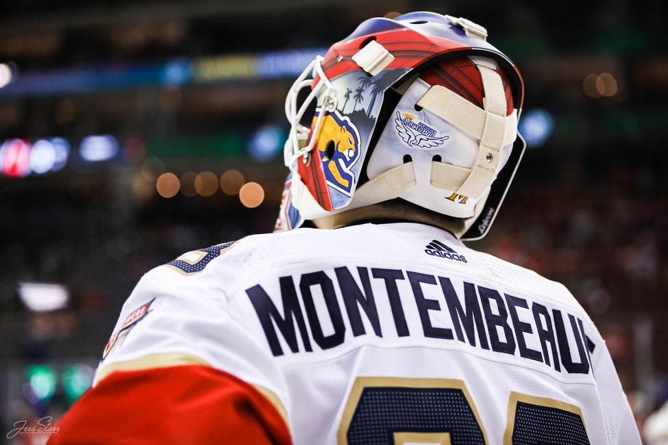 Montreal Canadiens' Sam Montembeault wears a pride-themed warmup