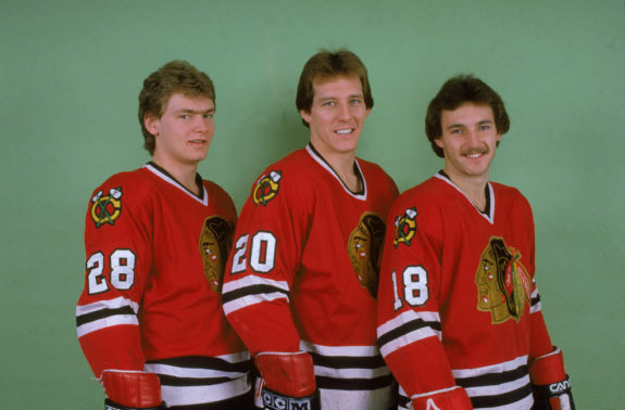 Steve Larmer, Al Secord, and Denis Savard