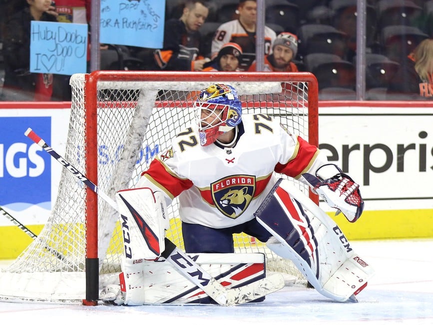 Florida Panthers goaltender Sergei Bobrovsky waves to the crowd while  standing next to his wife, Olga, during a ceremony celebrating his 500th  game that came last year, before the team's NHL hockey