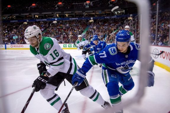 Dallas Stars' Jason Dickinson and Vancouver Canucks' Nikolay Goldobin