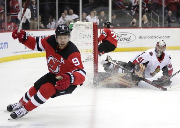 Ottawa Senators goaltender Craig Anderson and New Jersey Devils left wing Taylor Hall