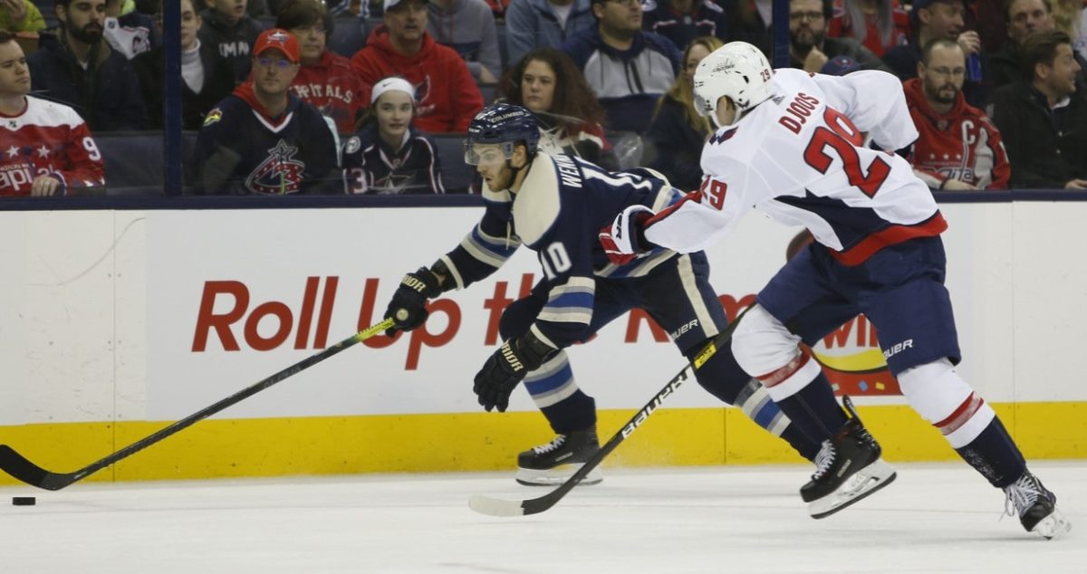 Columbus Blue Jackets' Alexander Wennberg Washington Capitals' Christian Djoos