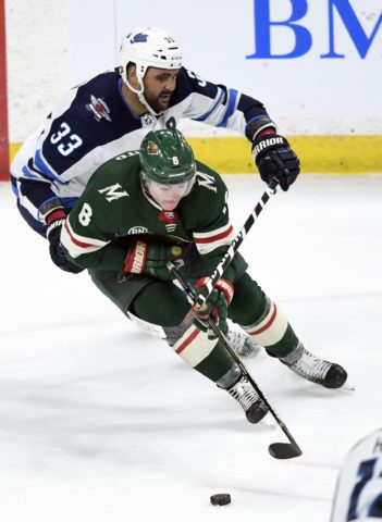 Minnesota Wild's Ryan Donato Winnipeg Jets' Dustin Byfuglien