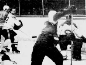 Jacques Plante makes one of his 25 saves last night.