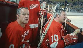 Alex Delvecchio (10) and Gordie Howe