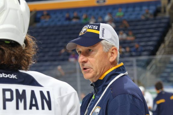 Terry Murray chats with a prospect during development camp in 2015. Photo by Bill Wippert/Buffalo Sabres 