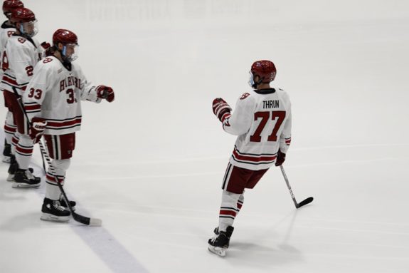 Henry Thrun skates to the blueline.