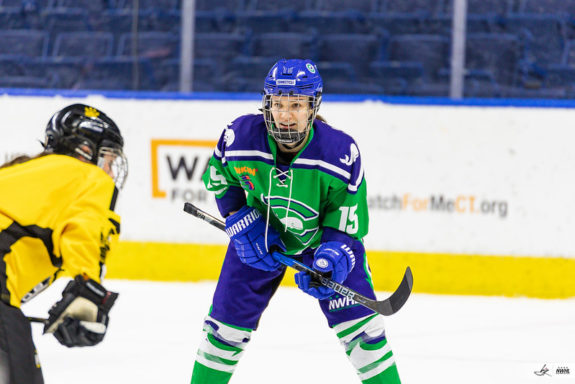 Emma Vlasic of the Connecticut Whale readies for a face-off. (Photo Credit: Bryan Johnson Photography)