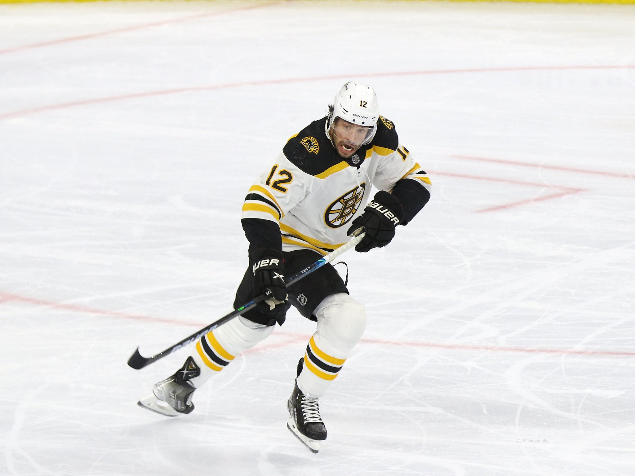 Craig Smith of the Bruins was happy to see the hats flying at the Garden -  The Boston Globe