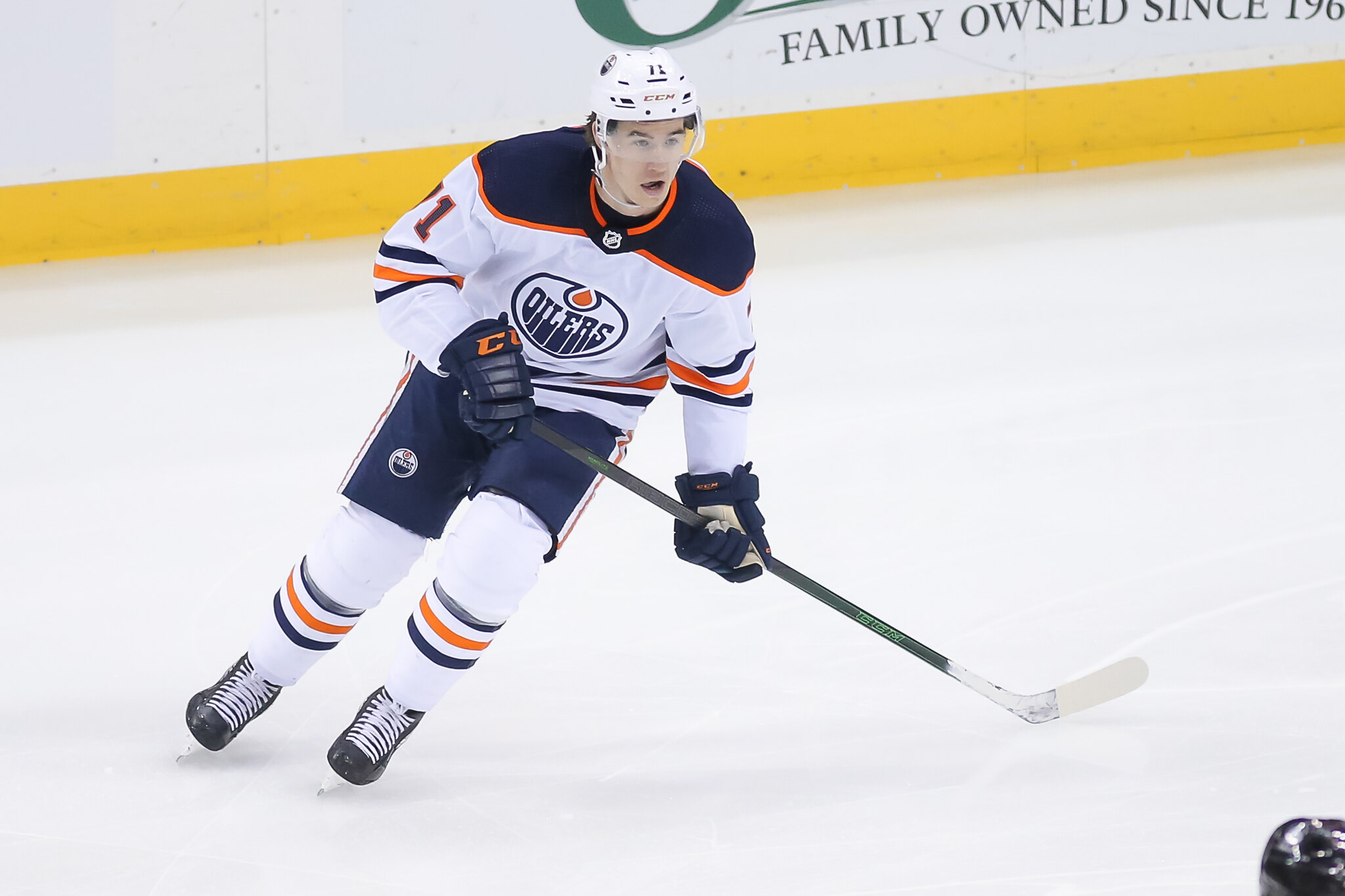 Edmonton Oilers' Ryan McLeod (71) moves the puck against the Carolina  Hurricanes during the first period of an NHL hockey game in Raleigh, N.C.,  Sunday, Feb. 27, 2022. (AP Photo/Karl B DeBlaker