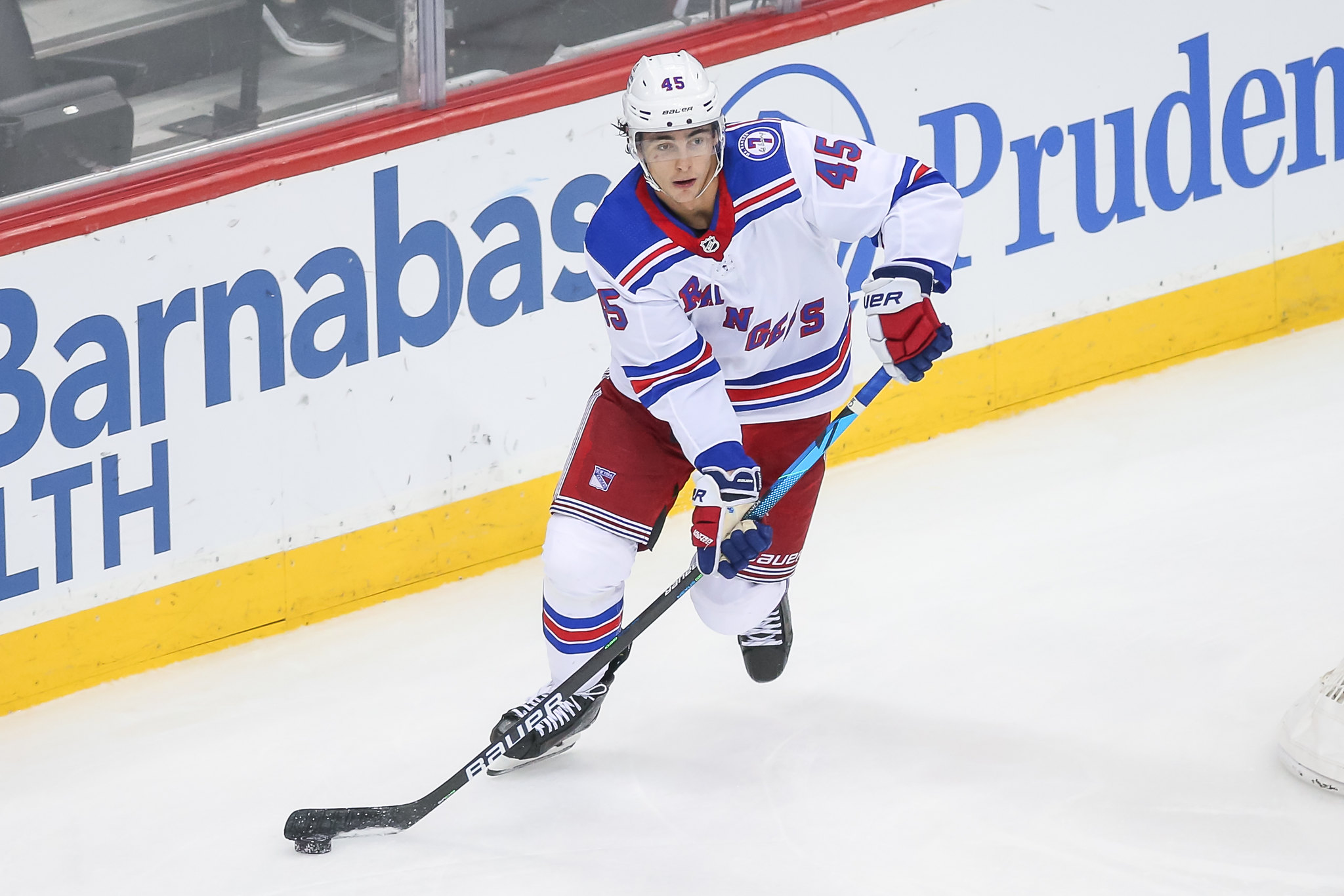 New York Rangers' Braden Schneider plays during an NHL hockey game