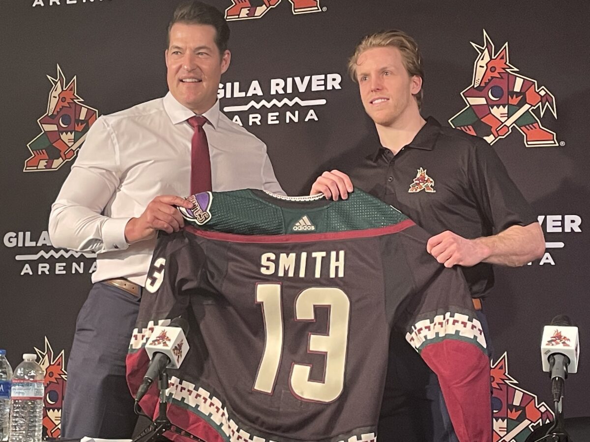 Coyotes GM Bill Armstrong introduces Nathan Smith on April 11, 2022 at Gila River Arena