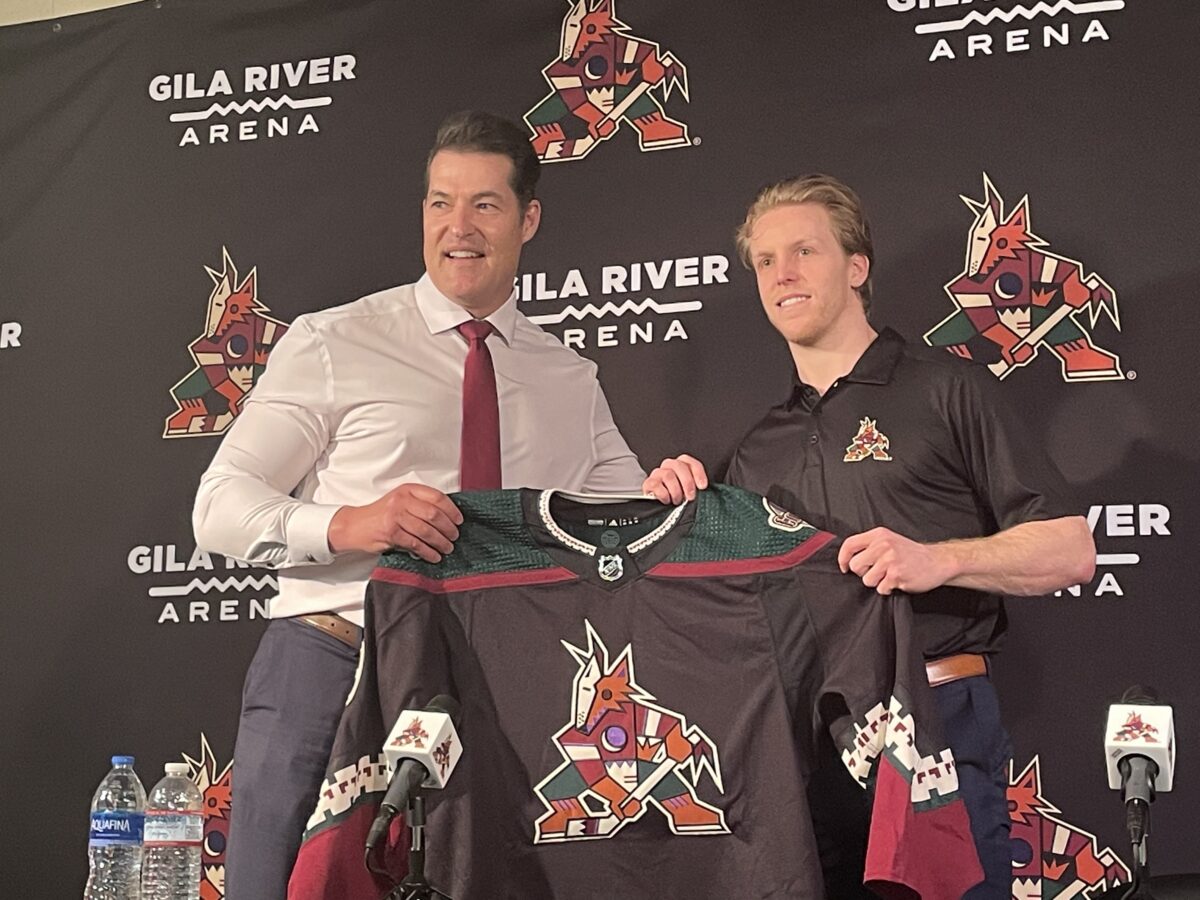 Coyotes GM Bill Armstrong introduces Nathan Smith on April 11, 2022 at Gila River Arena