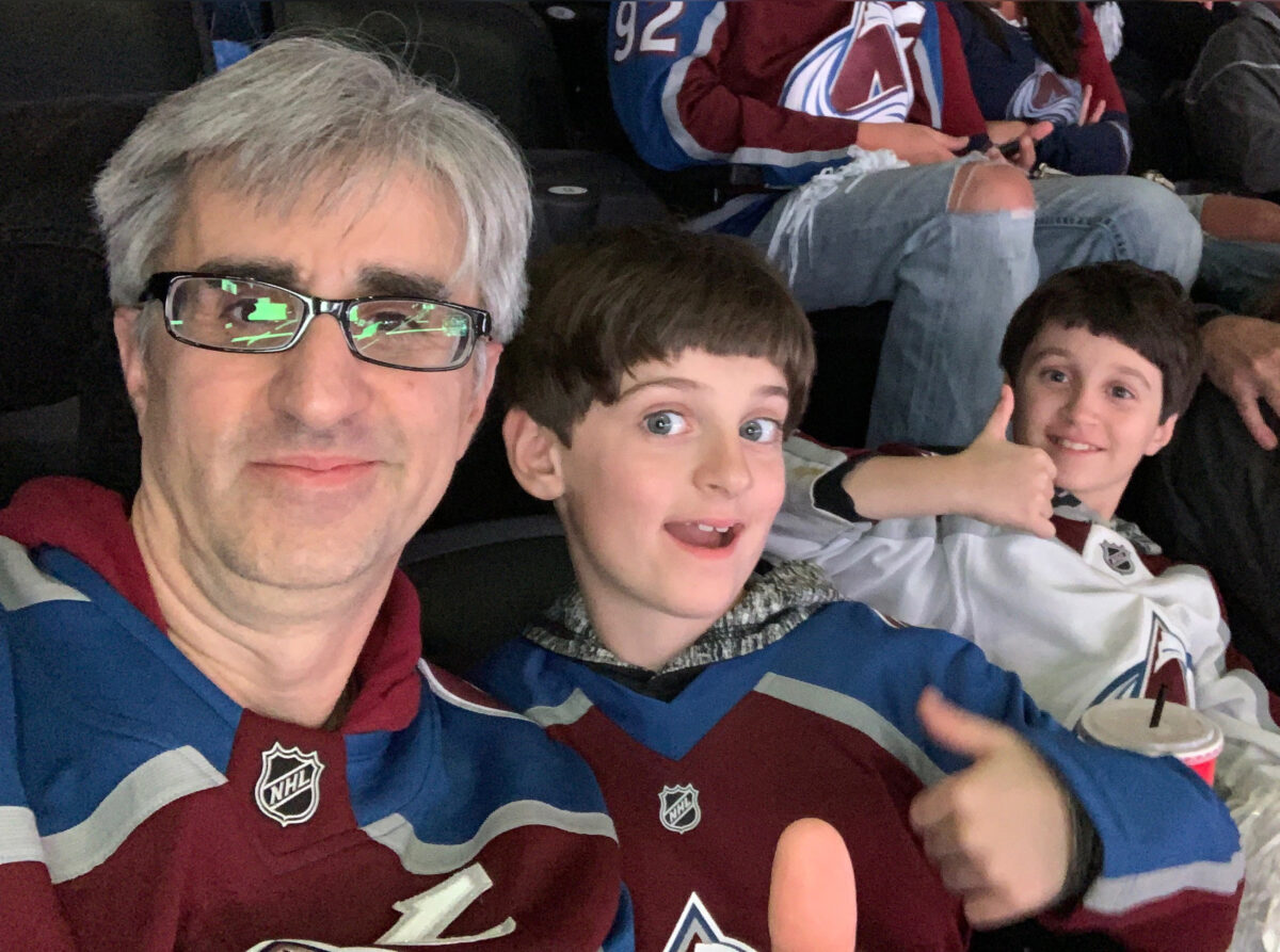 The author and his sons at an Avalanche playoff game.