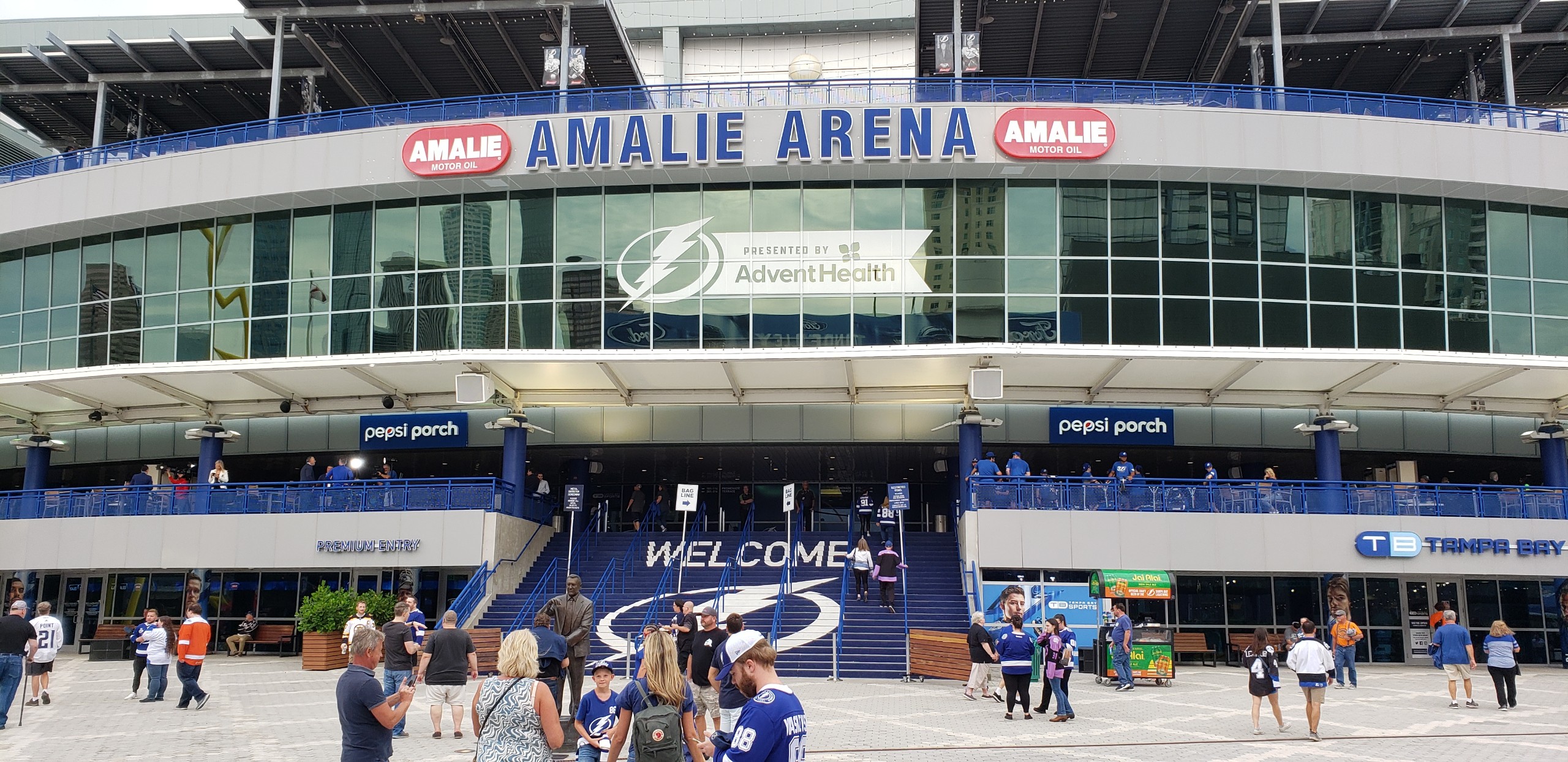 Tampa Bay Lightning fans gather around Amalie Arena to cheer in person