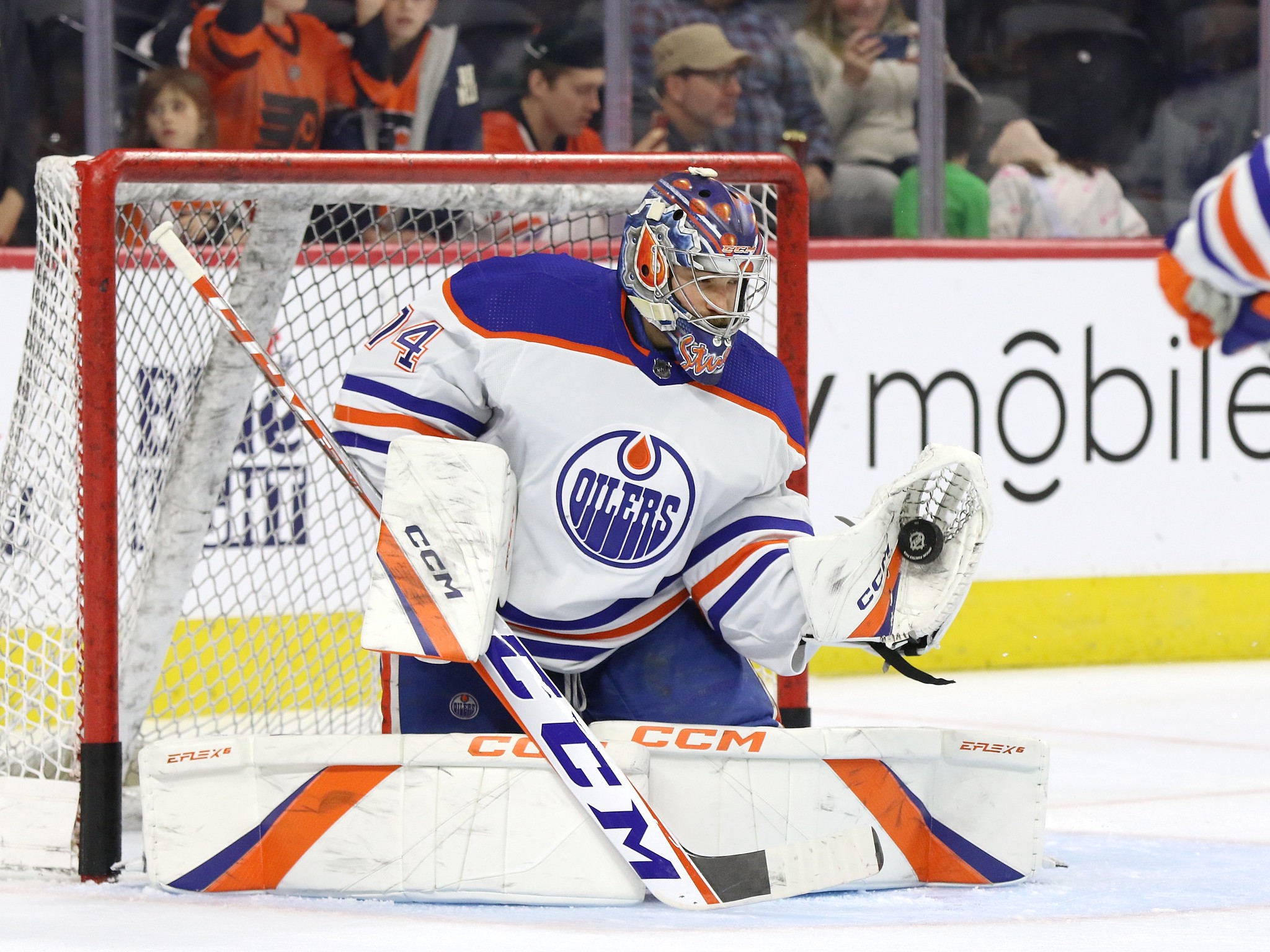 Edmonton Oilers goalie Grant Fuhr stretching before game vs