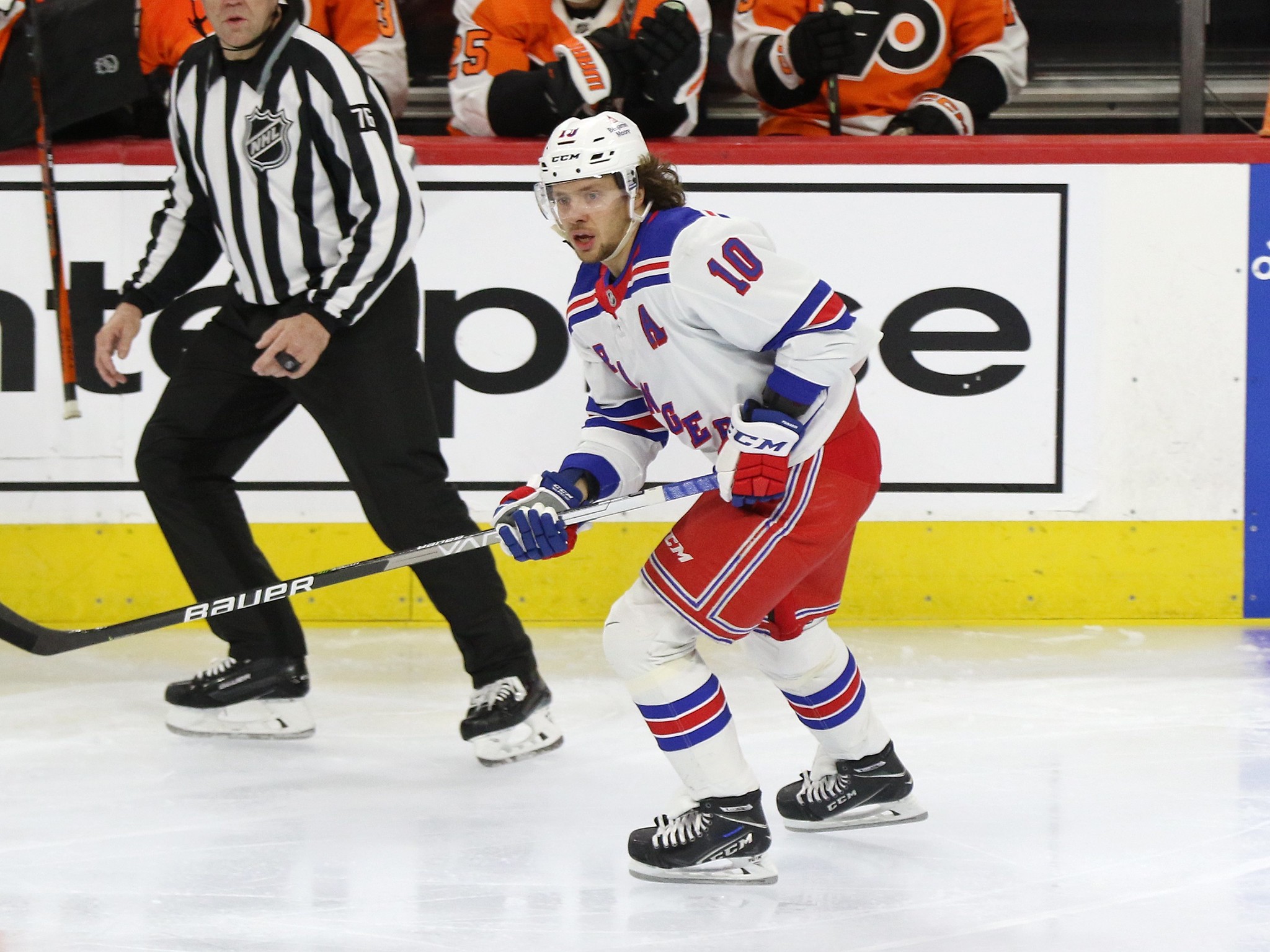 New York Rangers left wing Artemi Panarin (10) looks to pass the puck  during the third period of an NHL hockey game against the Ottawa Senators,  Thursday, March 2, 2023, in New