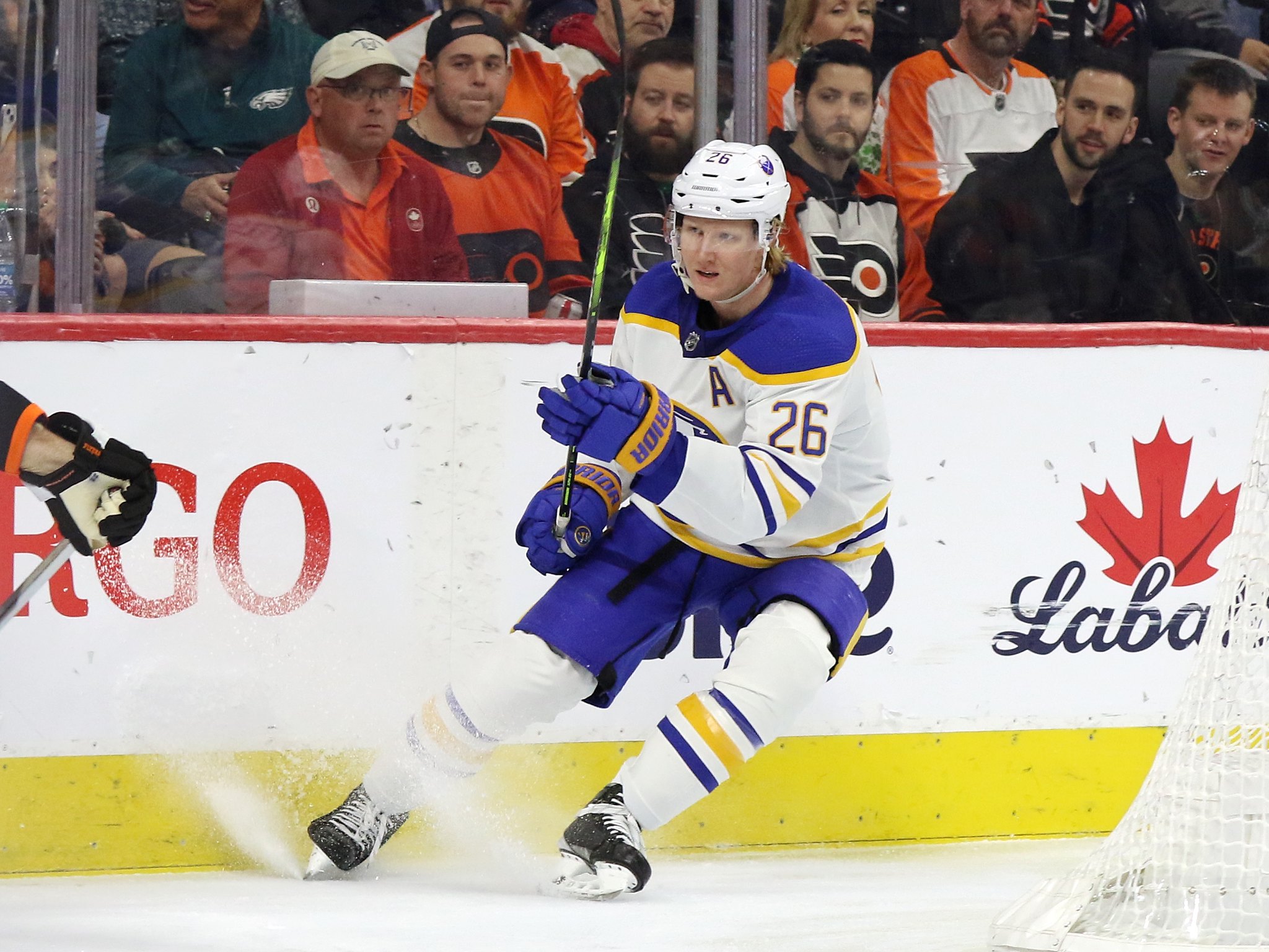 Kyle Okposo, right poses for a photo with New York Islanders head